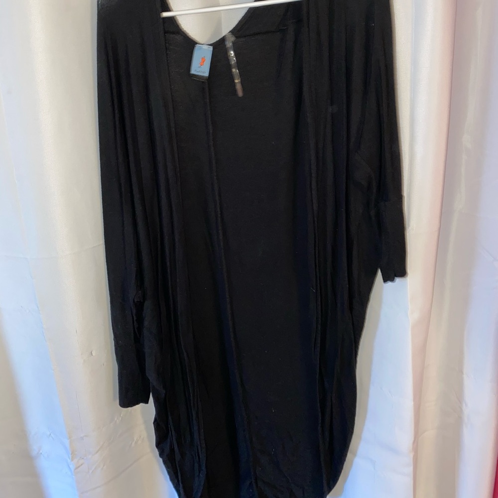black cardigan.